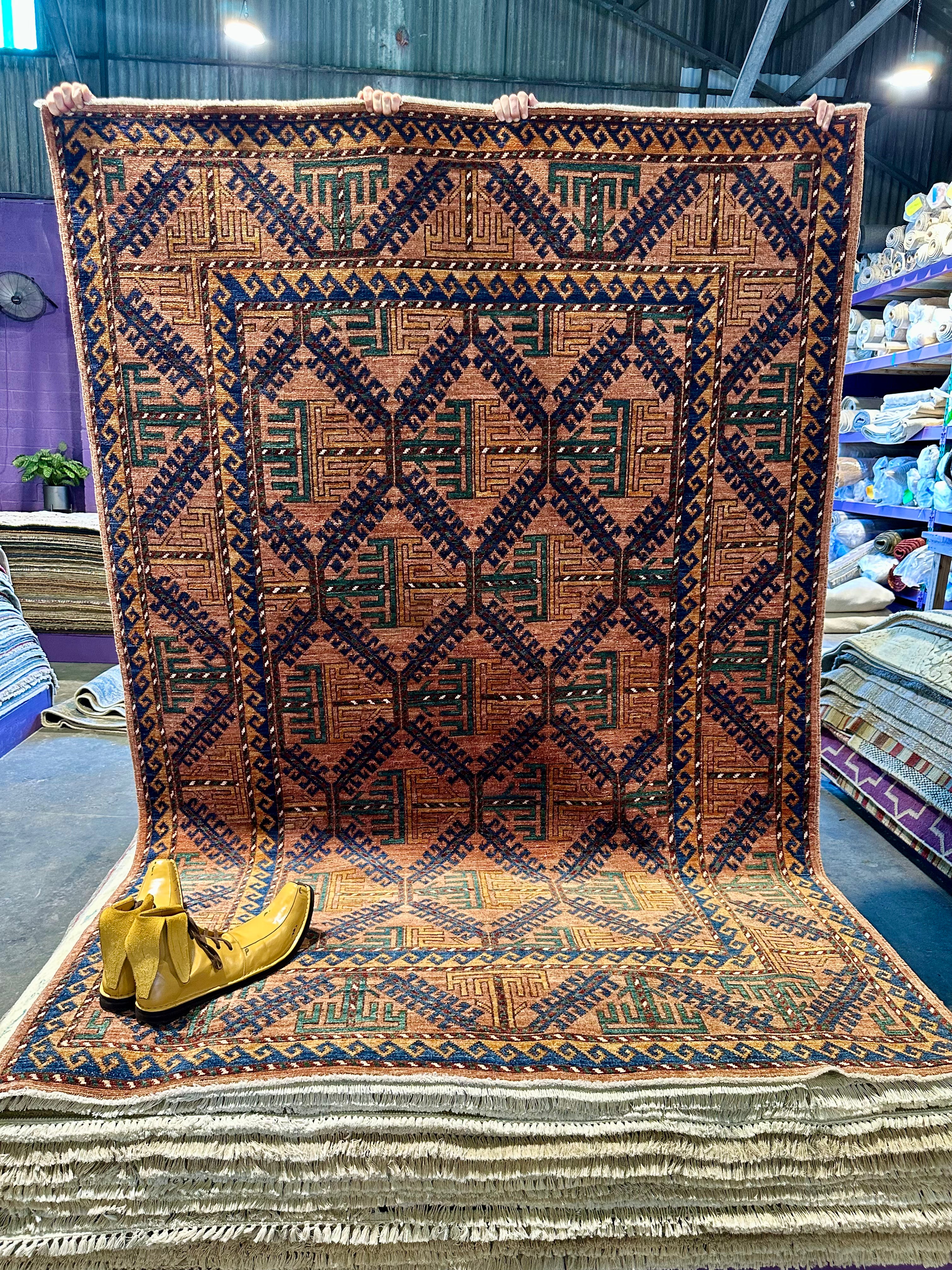 Becky Ann Baker 5.10x8.8 Rust Hand-Knotted Humna Rug