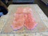 Four Pelt Light Pink Sheepskin Rug