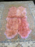 Four Pelt Light Pink Sheepskin Rug