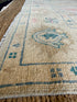 Ashley Comeau 7.6x9.9 Blue and Pink Whitewashed Afghani Oushak Rug