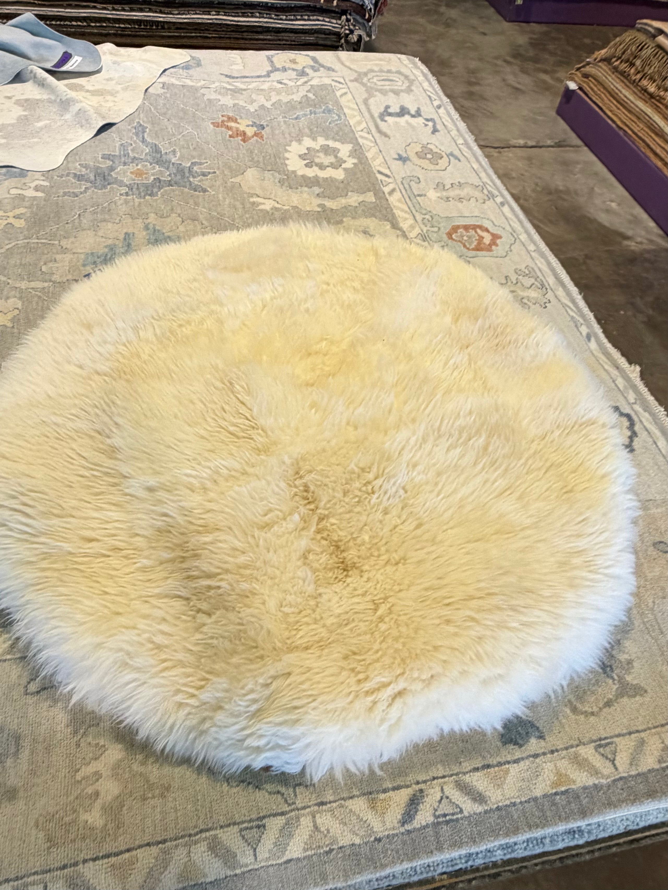 White Round Cowhide Rug