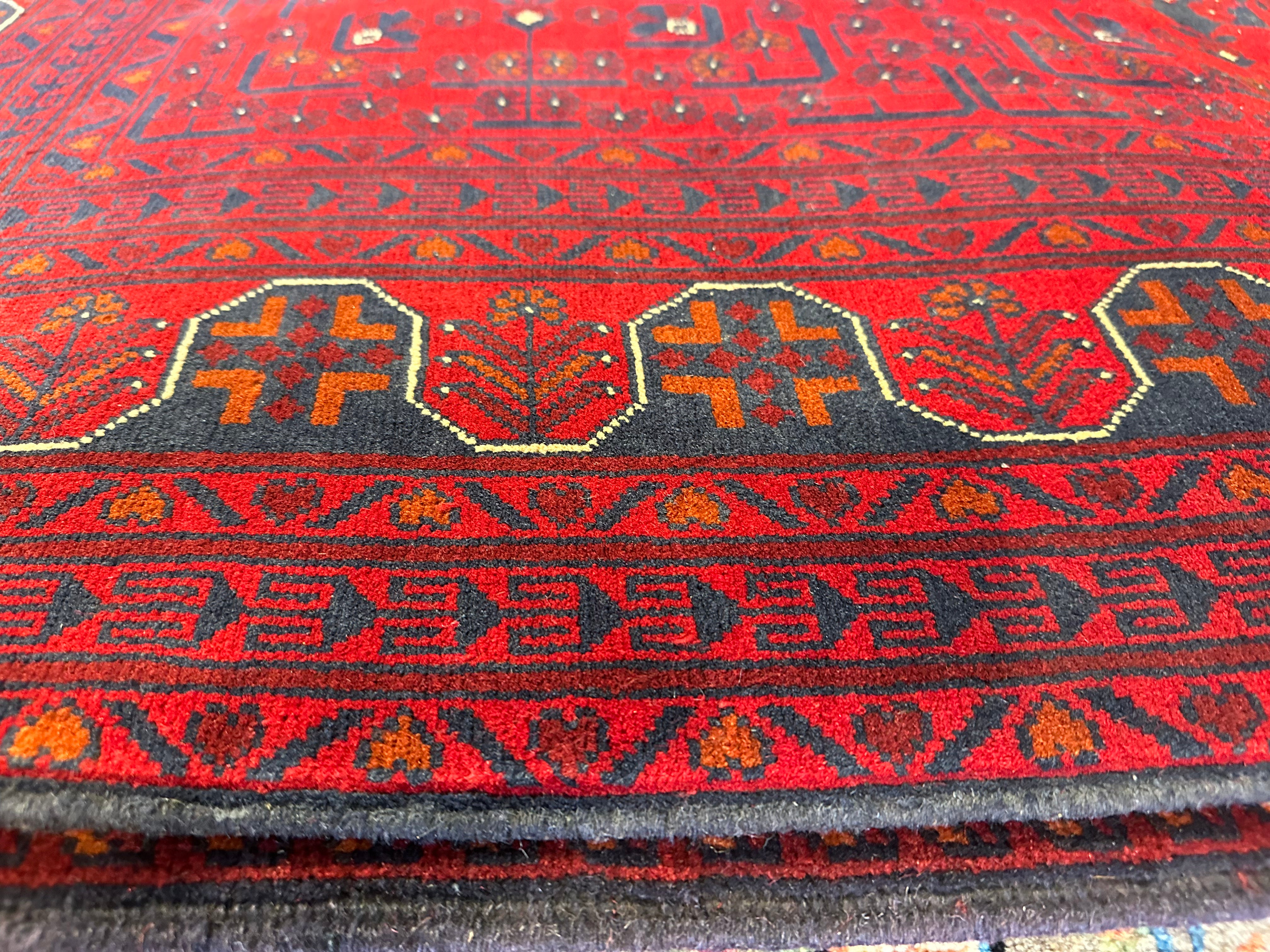 Kimmy Bowen 6.7x9.8 Red Afghani Khamyab Rug