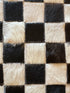 Tomahawk 2.3x7.10 Black and White Checkerboard Cowhide Runner