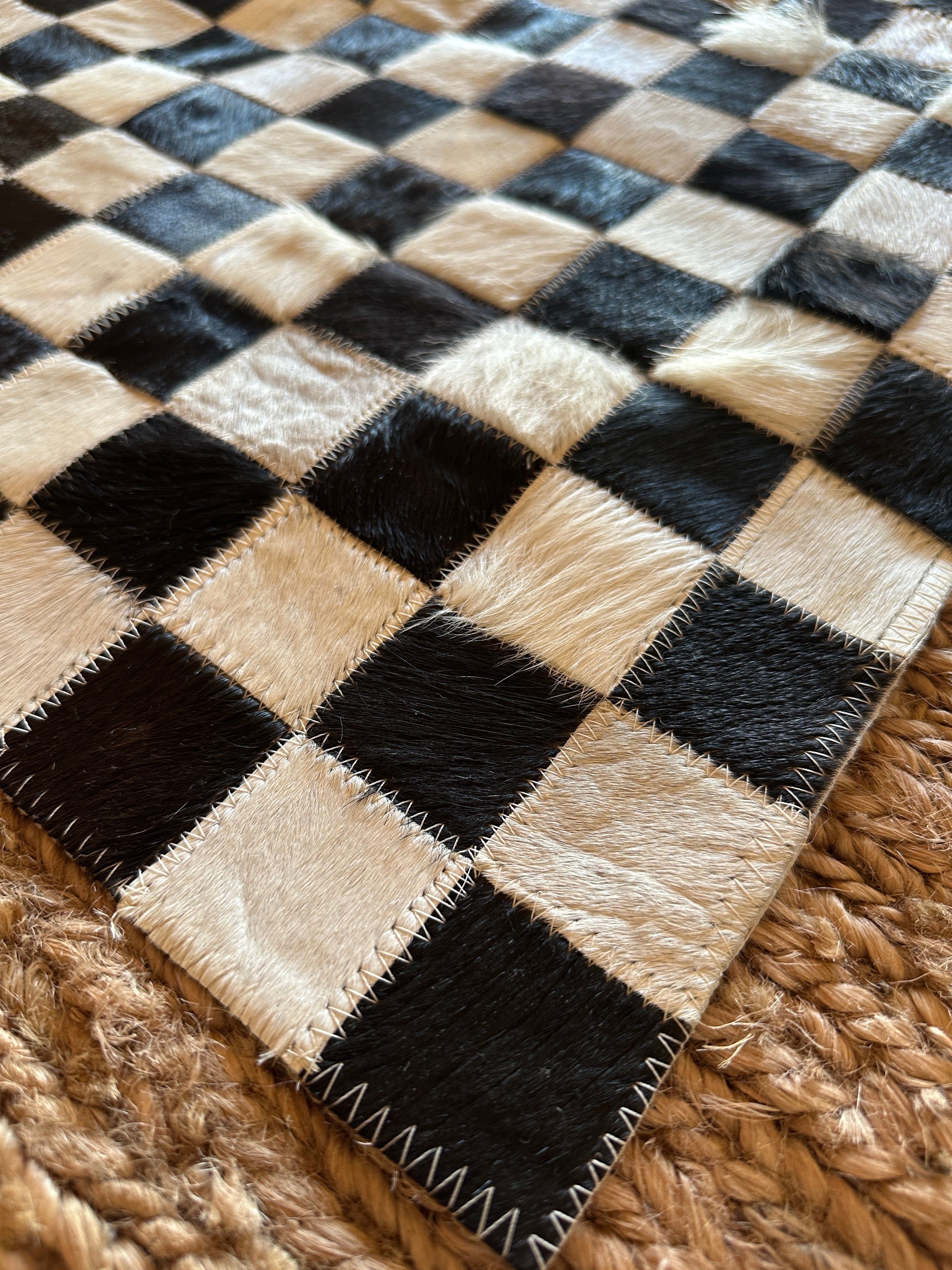 Tomahawk 2.3x7.10 Black and White Checkerboard Cowhide Runner