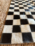 Tomahawk 2.3x7.10 Black and White Checkerboard Cowhide Runner