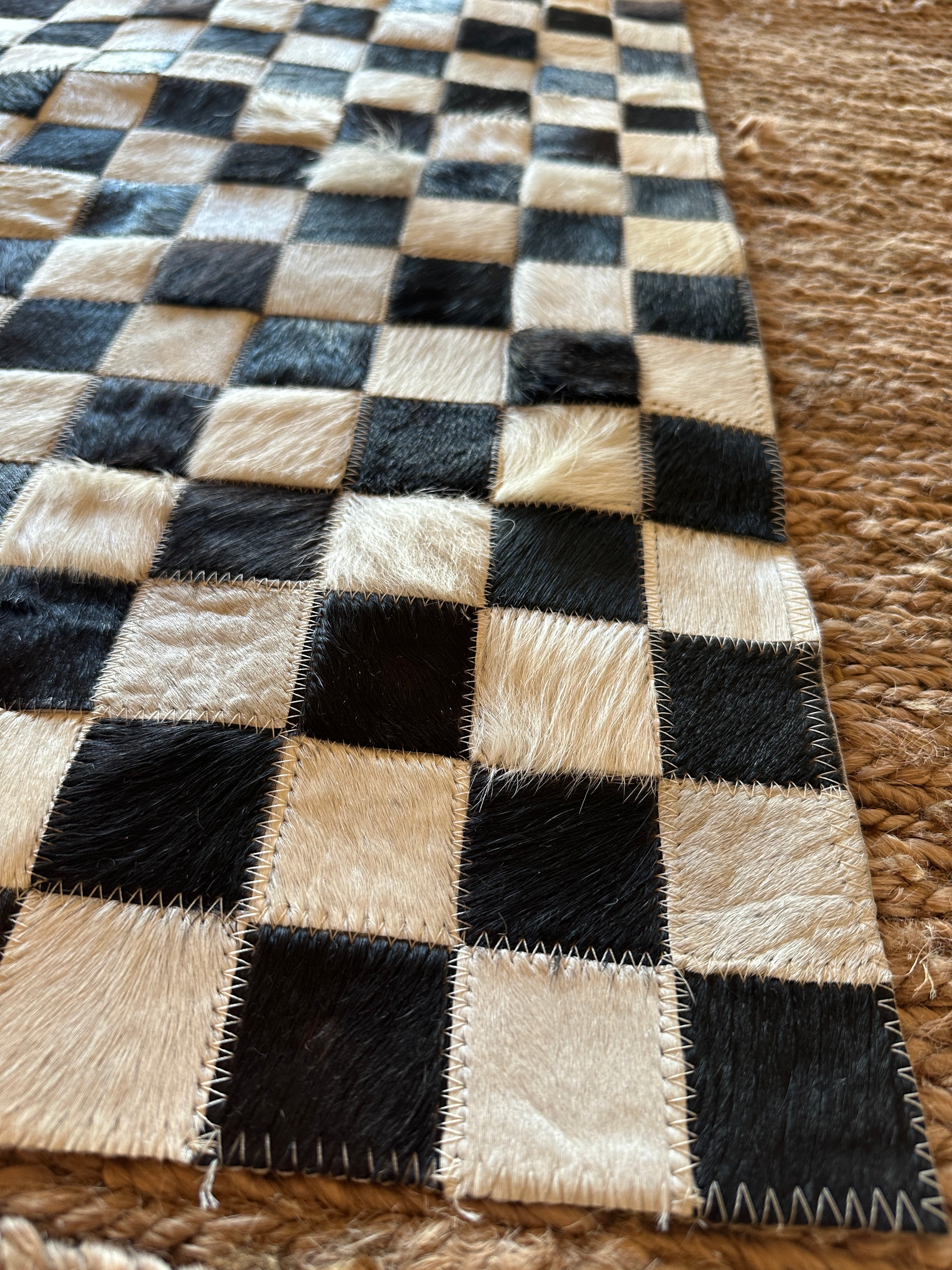 Tomahawk 2.3x7.10 Black and White Checkerboard Cowhide Runner