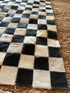 Tomahawk 2.3x7.10 Black and White Checkerboard Cowhide Runner