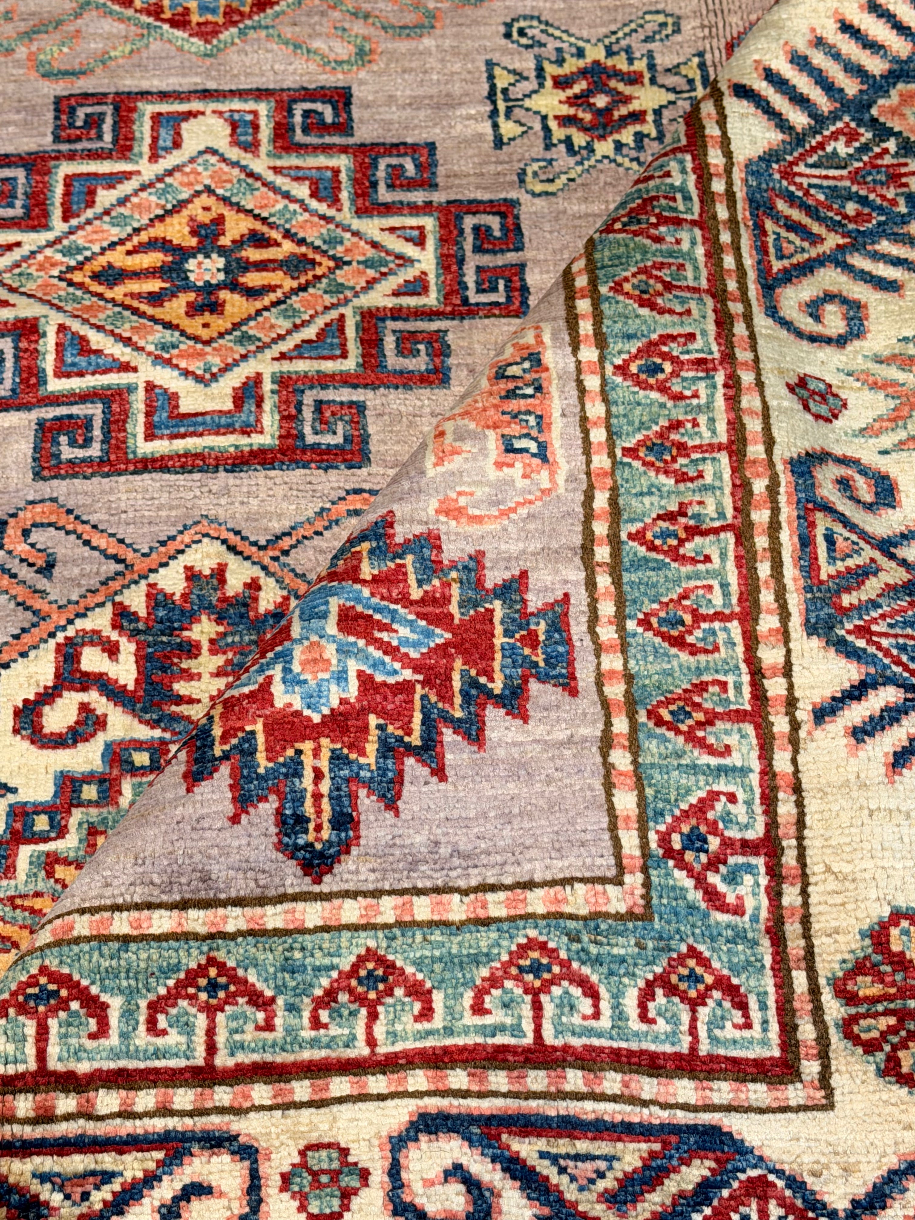 Toni Collette 5.5x8.3 Purple Afghani Kazak Rug