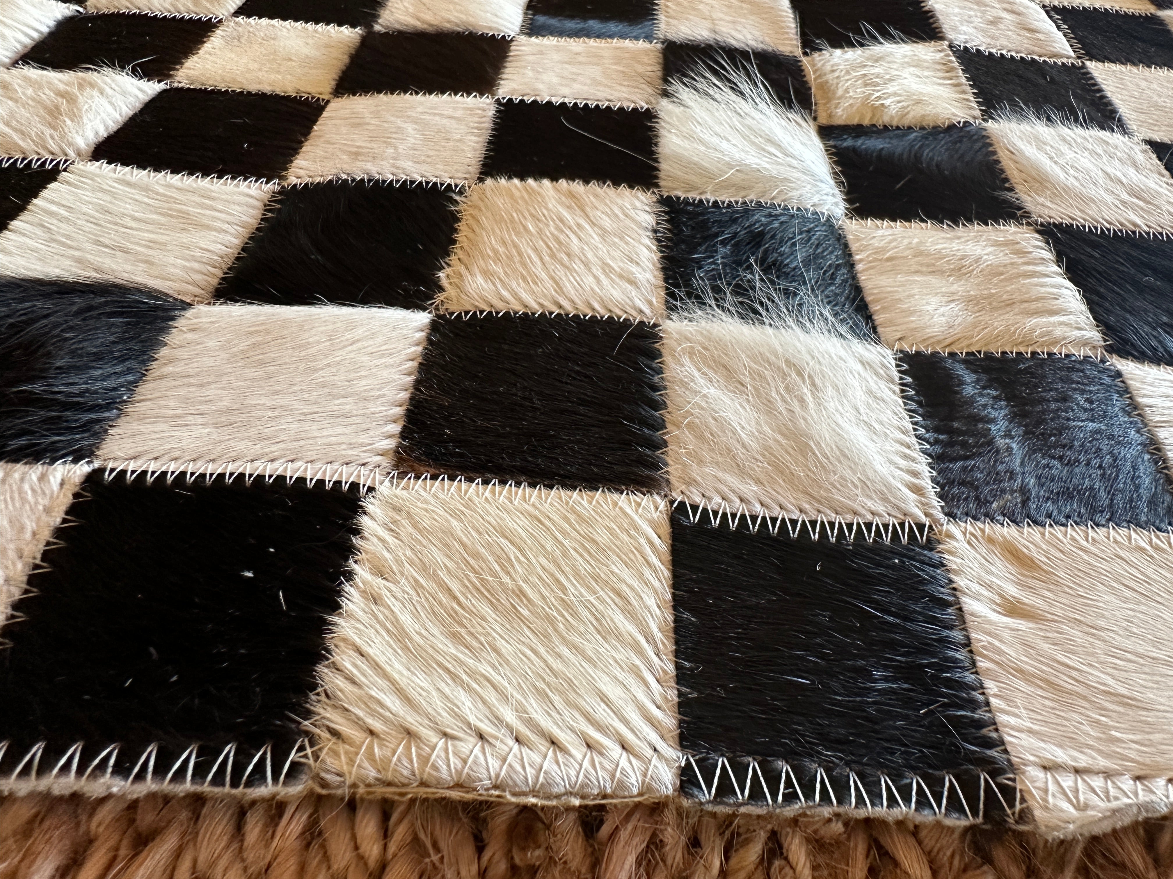 Tomahawk 2.3x7.10 Black and White Checkerboard Cowhide Runner