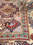 Toni Collette 5.5x8.3 Purple Afghani Kazak Rug