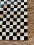 Tomahawk 2.3x7.10 Black and White Checkerboard Cowhide Runner