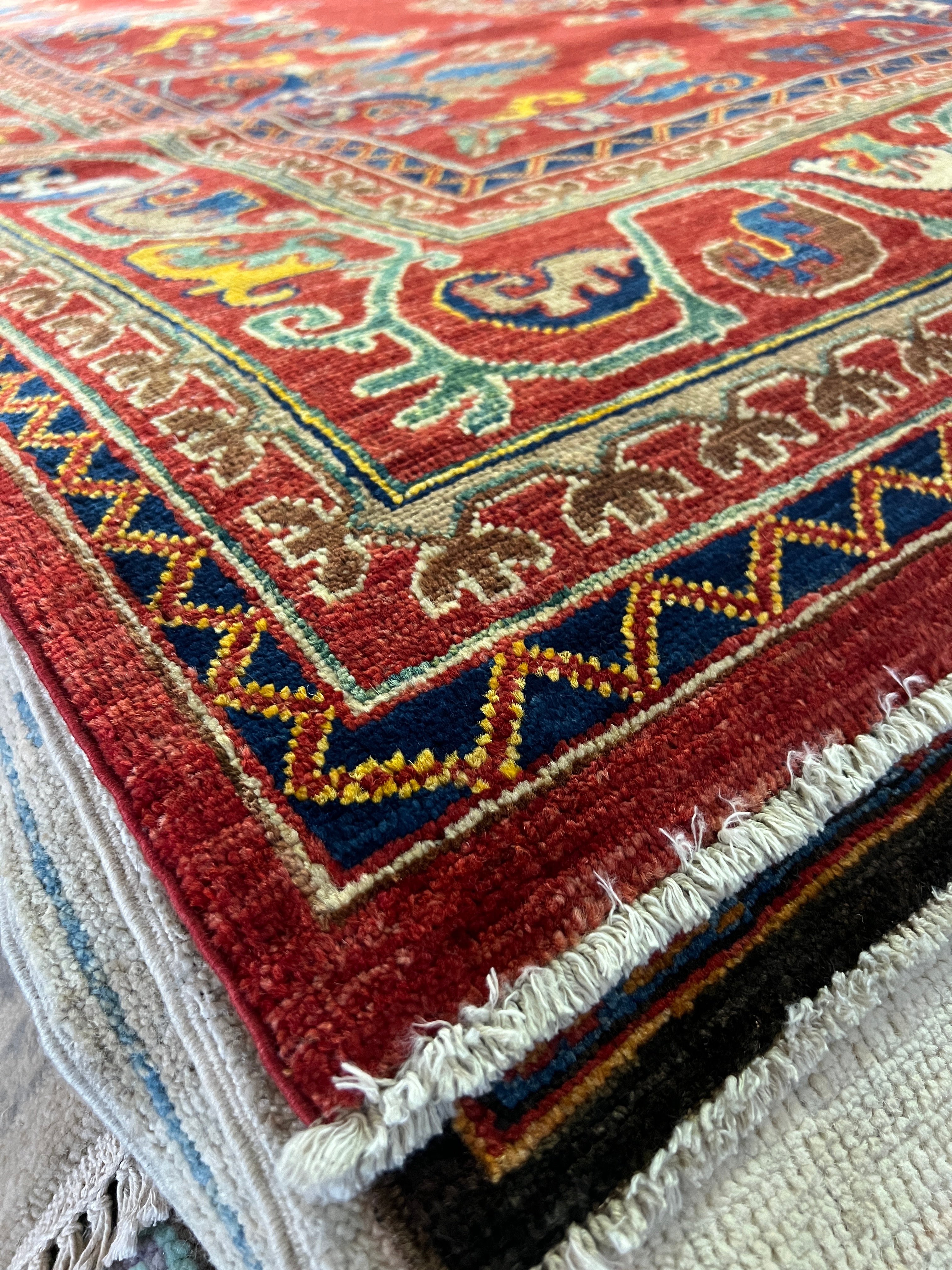 Adilyn 6x8.9 Red and Blue Hand-Knotted Nomadic Caucasian Humna Wool Rug