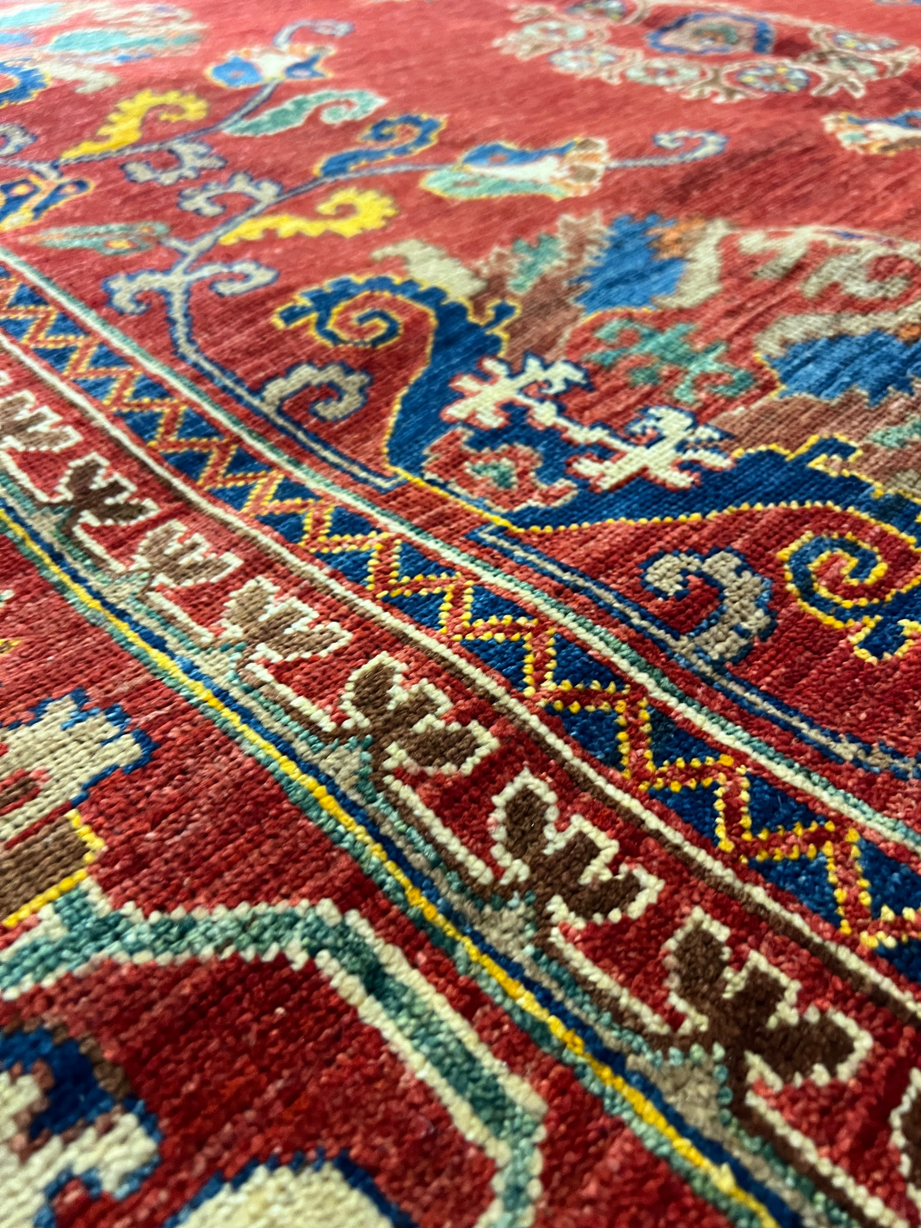 Adilyn 6x8.9 Red and Blue Hand-Knotted Nomadic Caucasian Humna Wool Rug