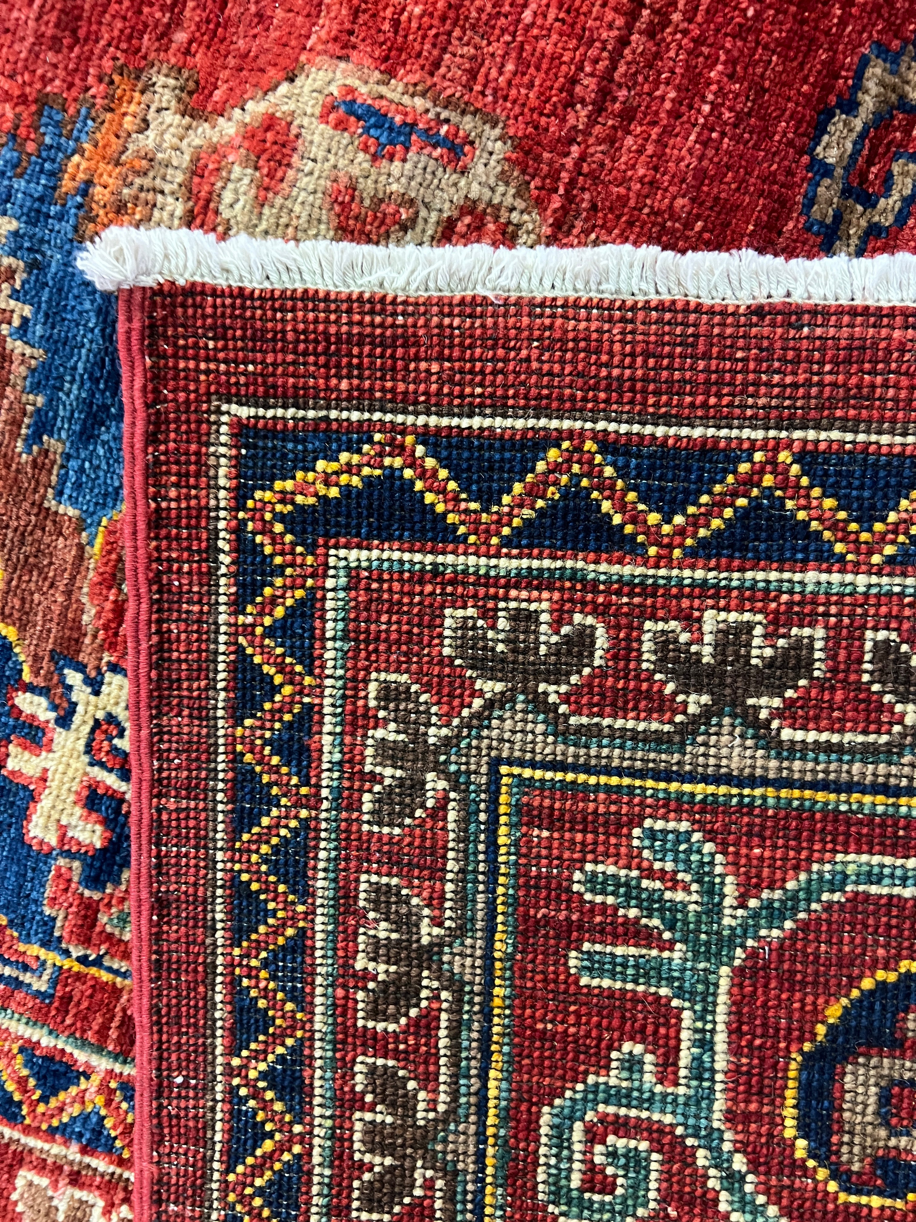 Adilyn 6x8.9 Red and Blue Hand-Knotted Nomadic Caucasian Humna Wool Rug