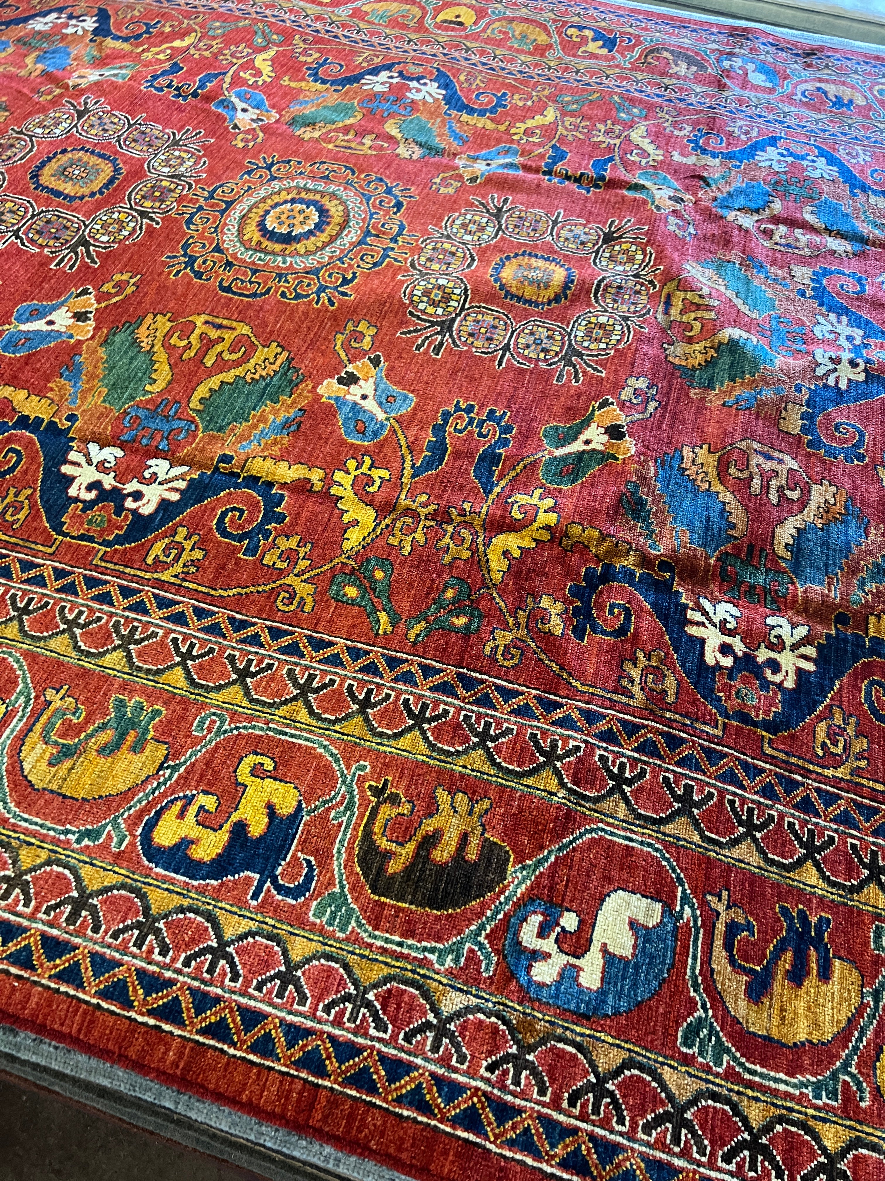 Crystal Norris 8.7x9.9 Red and Blue Hand-Knotted Nomadic Caucasian Humna Wool Rug