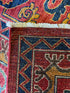 Amy Burley 9.5x11.6 Red and Blue Hand-Knotted Nomadic Caucasian Humna Wool Rug