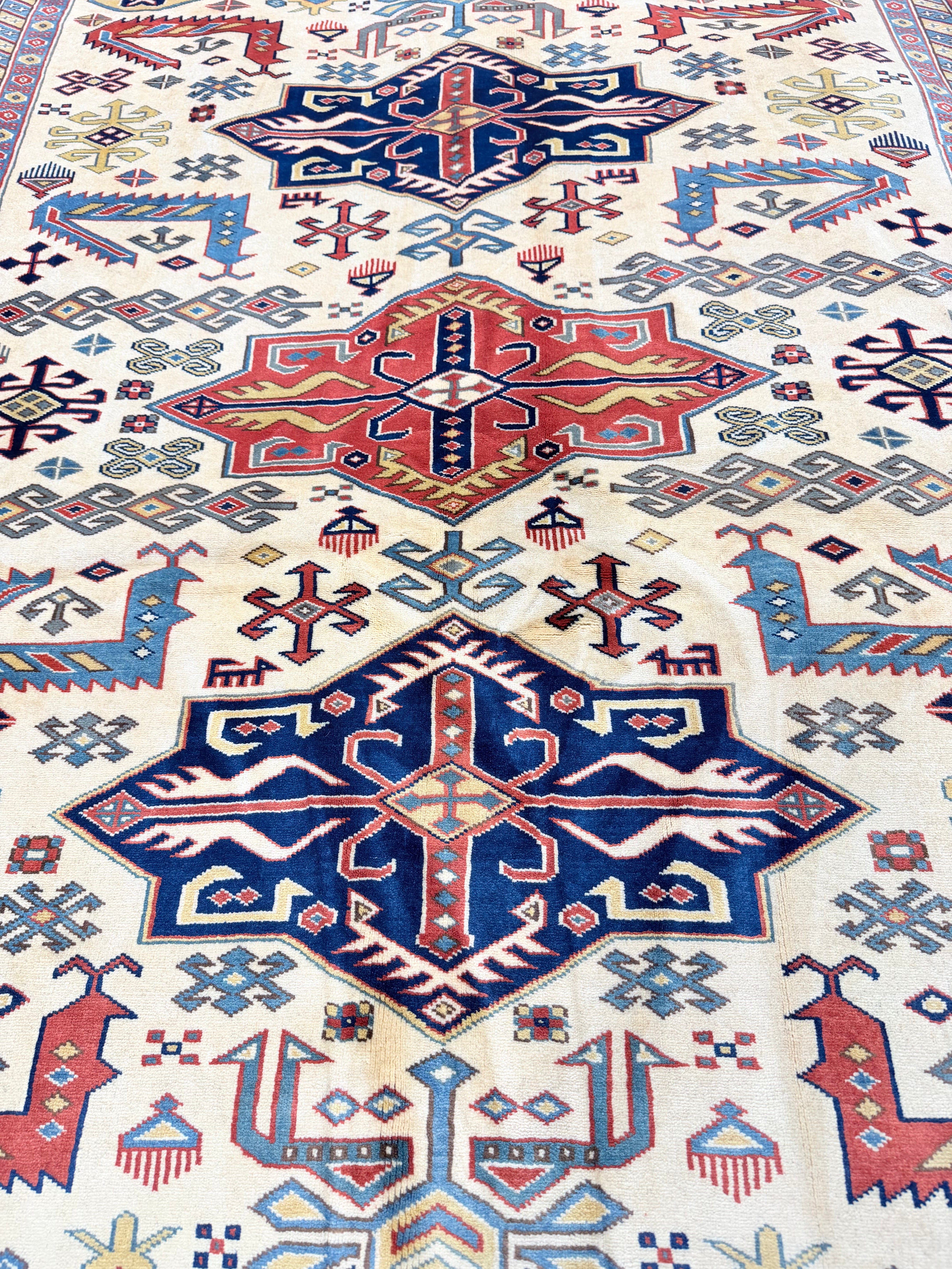 Jessie Nickson-Lopez 5.5x6.9 Afghani Kazak Cream and Red Rug