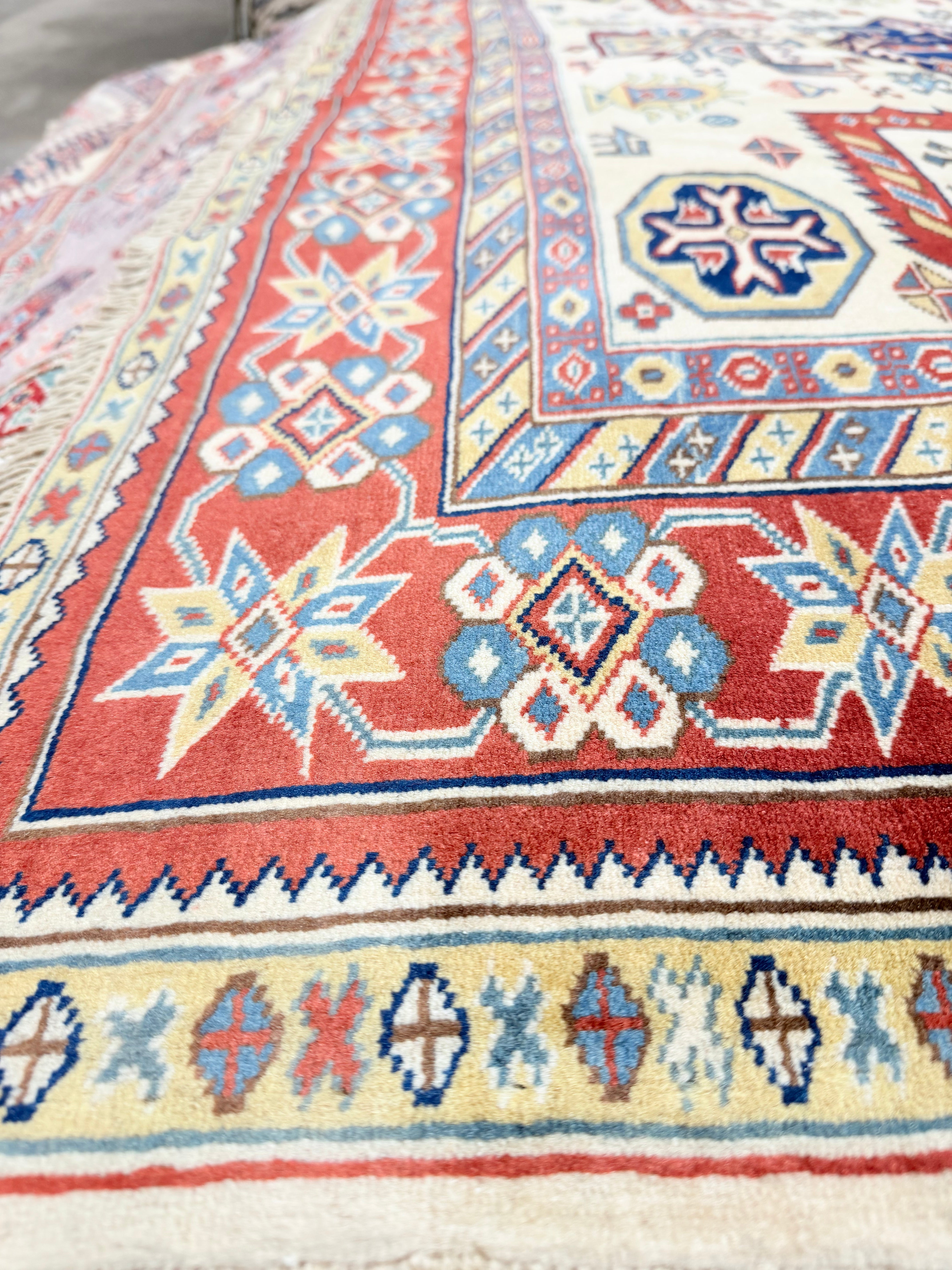 Jessie Nickson-Lopez 5.5x6.9 Afghani Kazak Cream and Red Rug