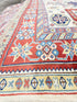 Jessie Nickson-Lopez 5.5x6.9 Afghani Kazak Cream and Red Rug