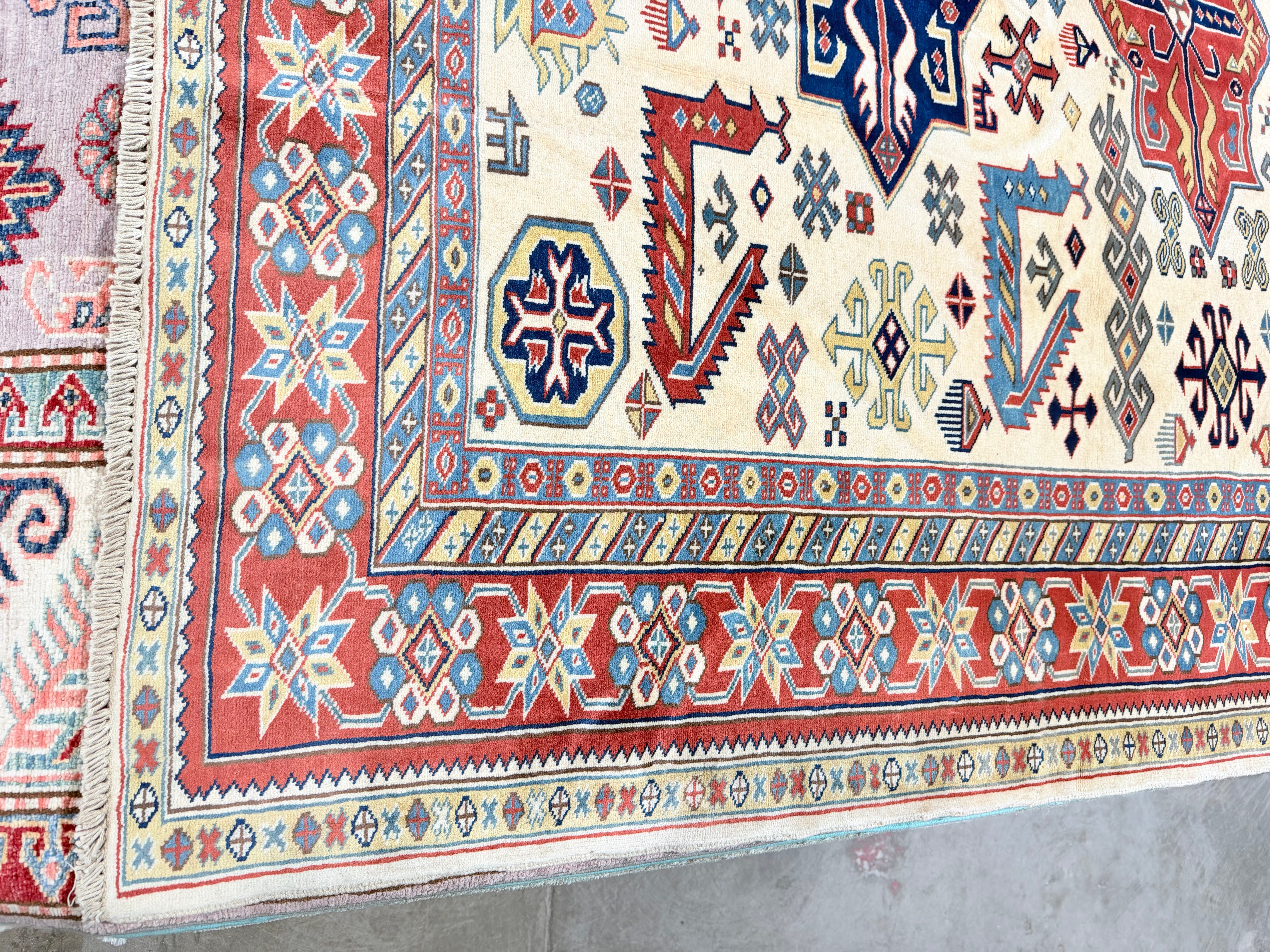 Jessie Nickson-Lopez 5.5x6.9 Afghani Kazak Cream and Red Rug