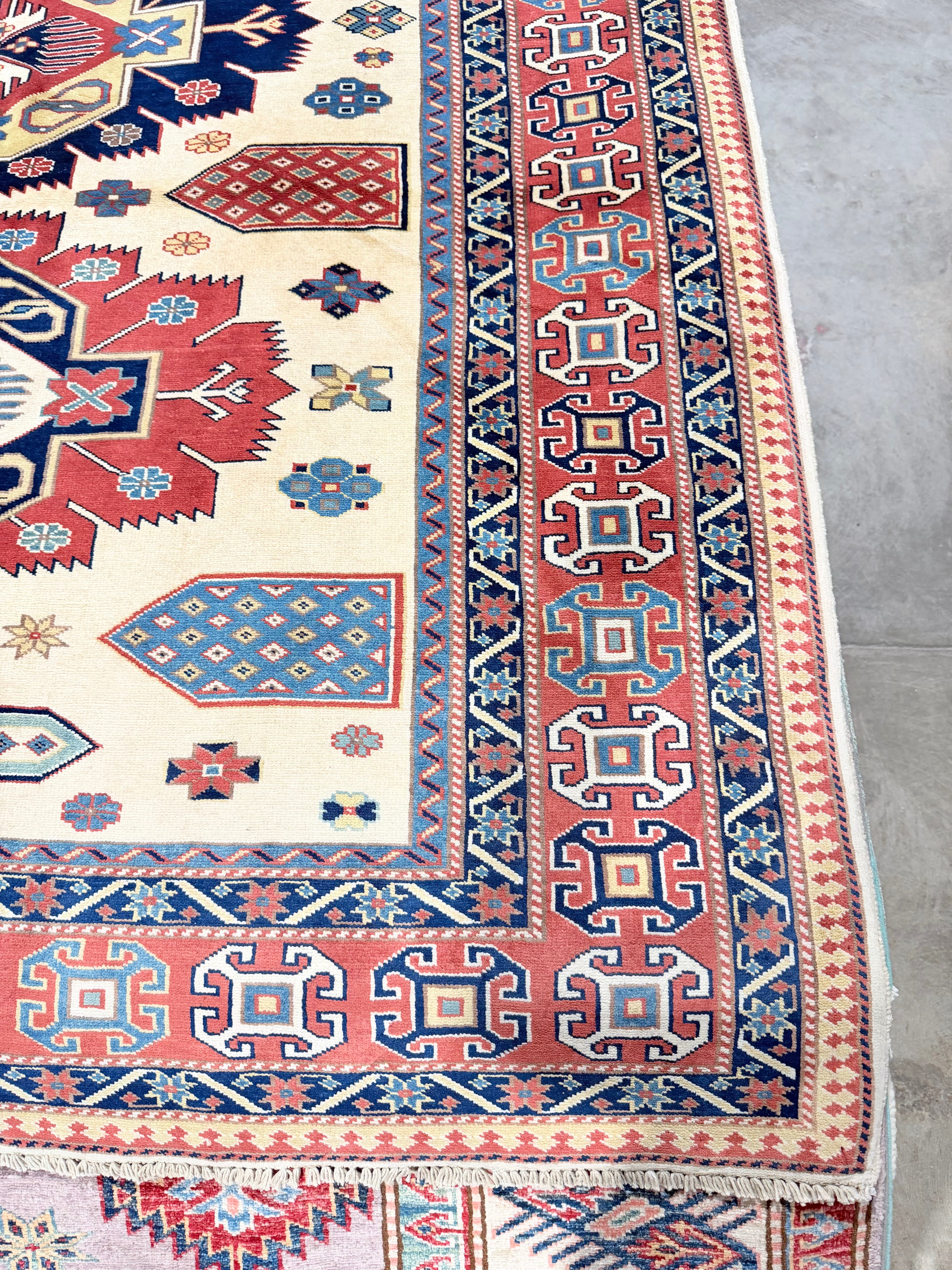 Caitlin Schneiderhan 5.4x7 Afghani Kazak Red Rug