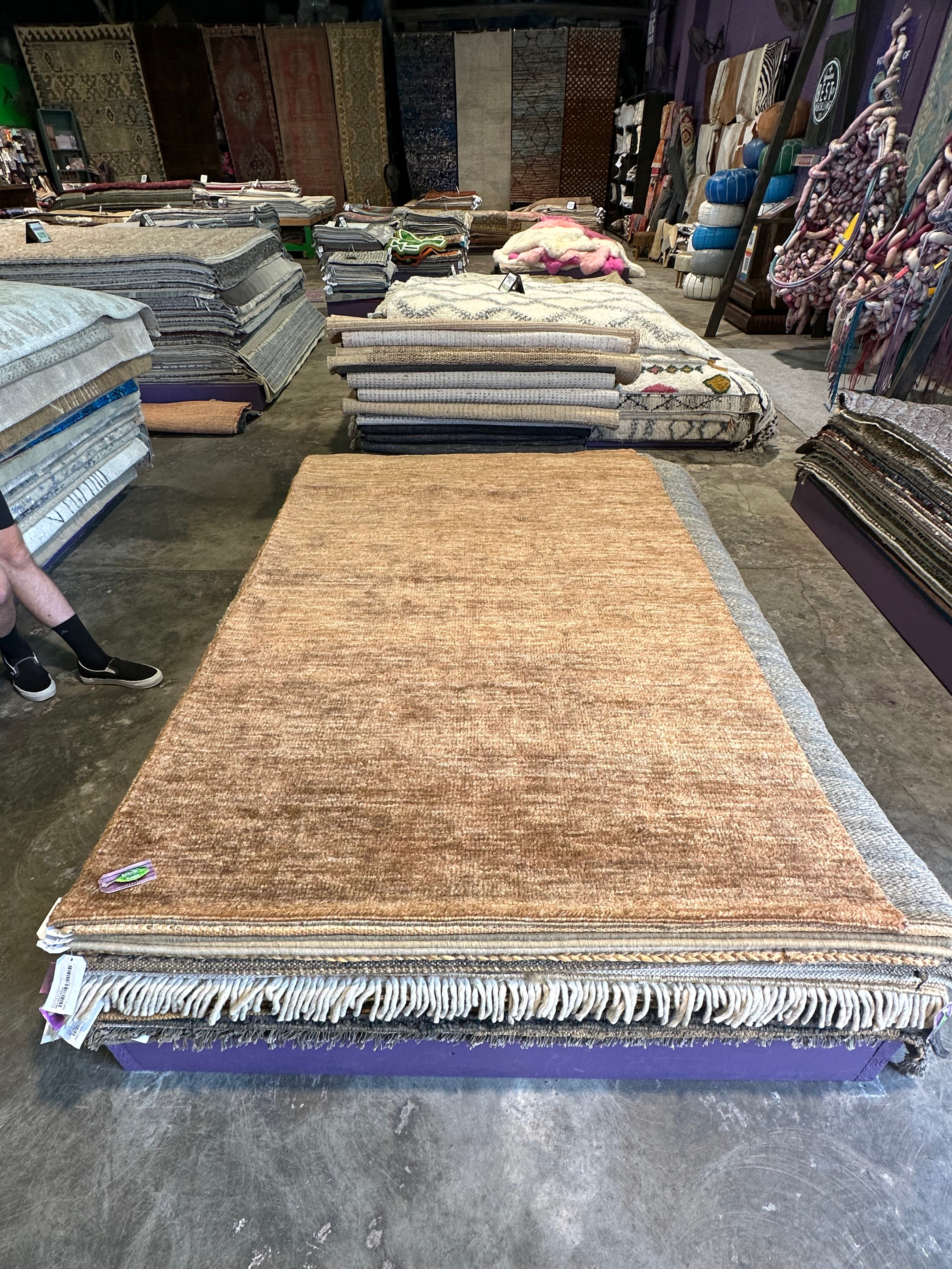 T.C. Calvin 4.9X8 Brown Sheared Durrie Rug