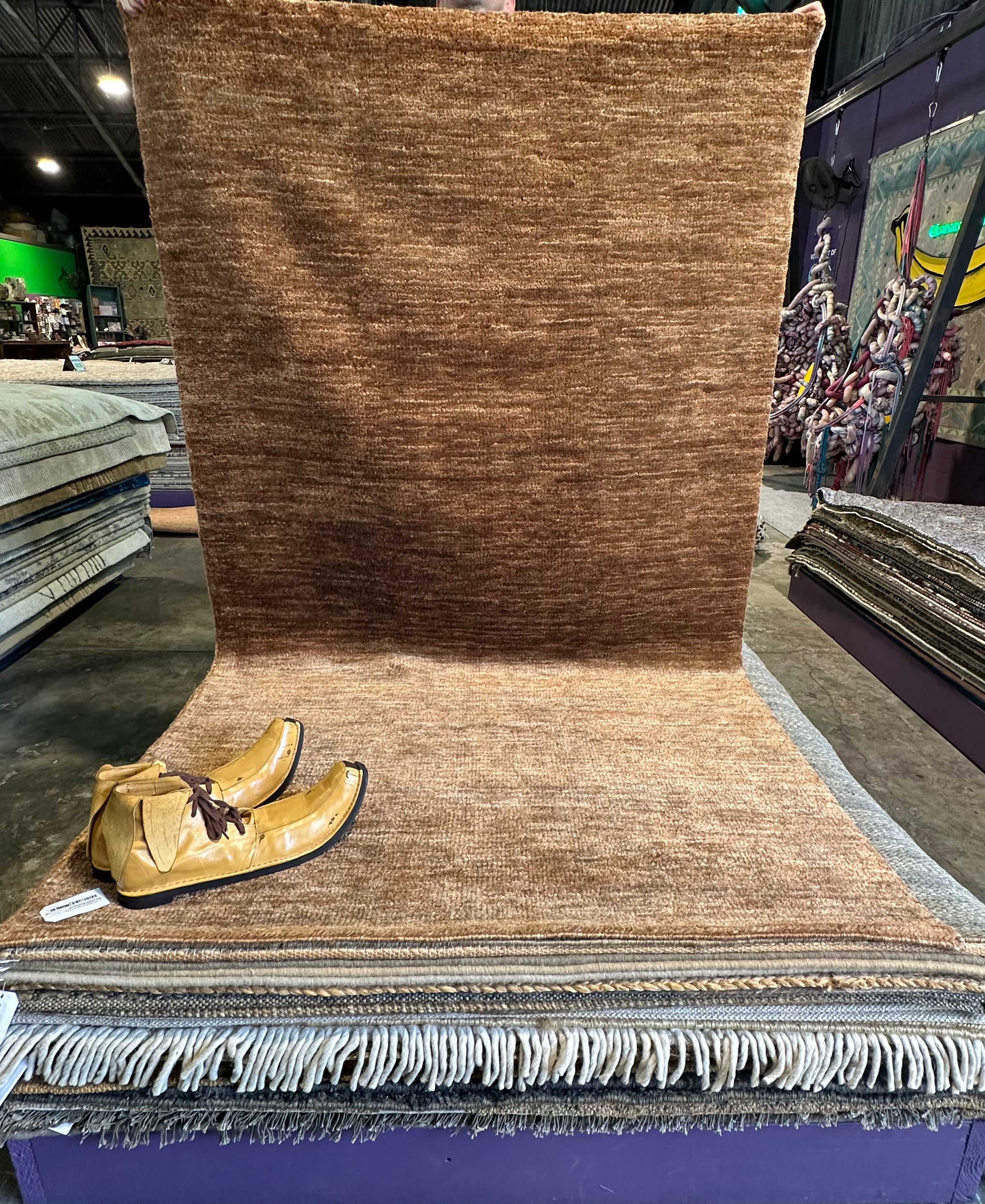 T.C. Calvin 4.9X8 Brown Sheared Durrie Rug
