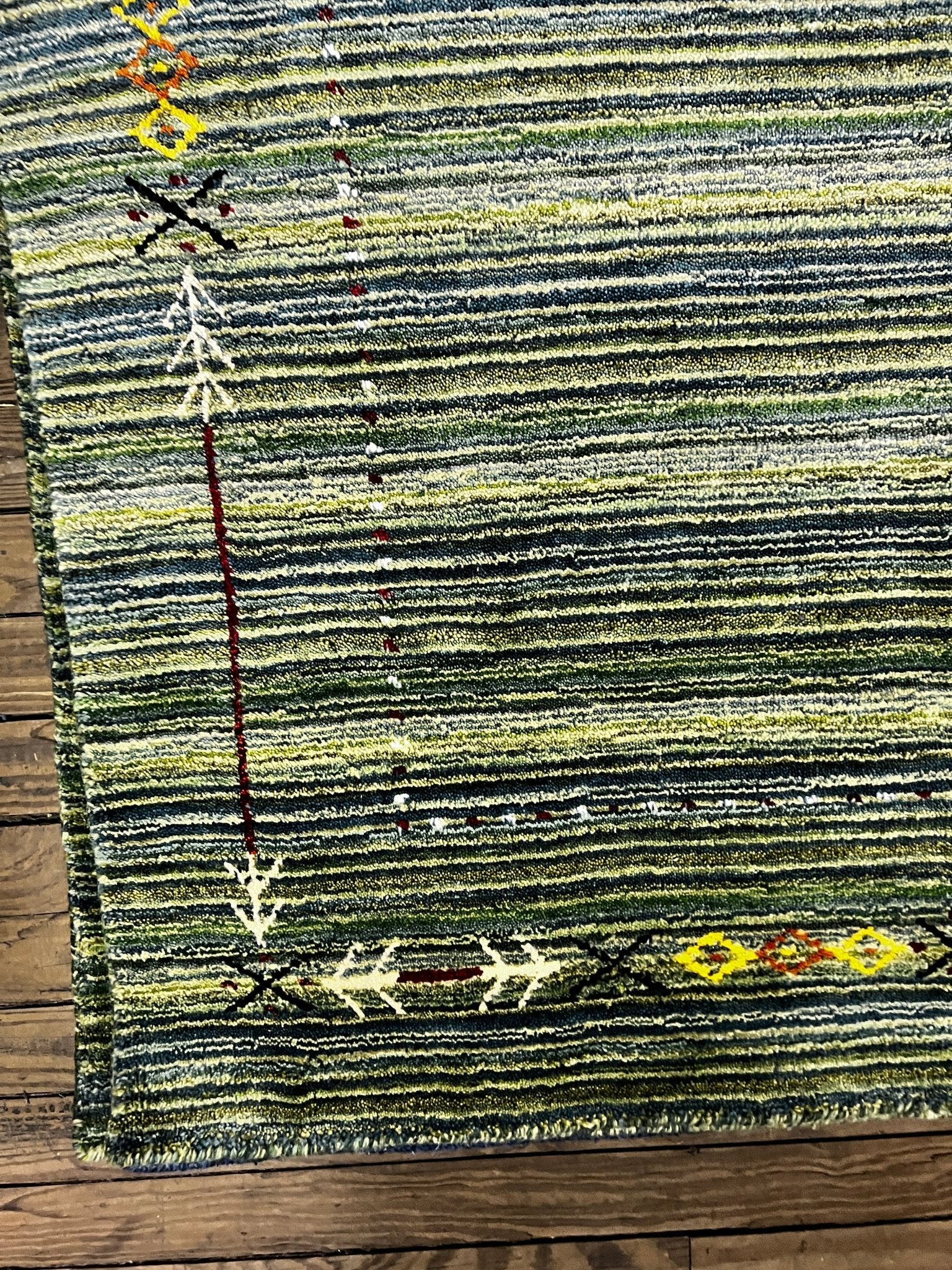 https://bananamanor.com/cdn/shop/products/3x49-green-handwoven-gabbeh-rug-502149.jpg?v=1692008755