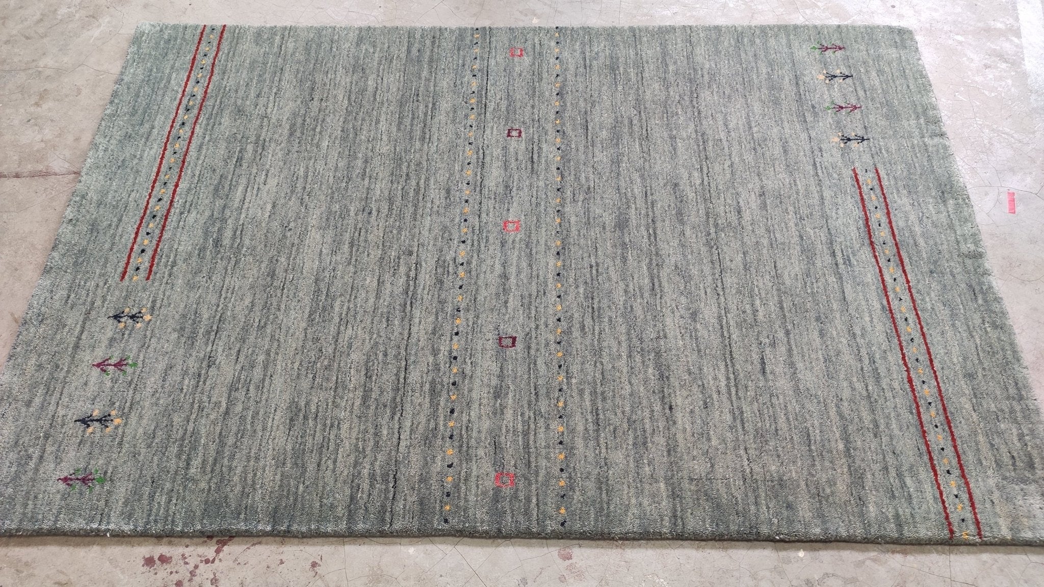 https://bananamanor.com/cdn/shop/products/3x49-grey-handwoven-gabbeh-rug-931256.jpg?v=1697059979