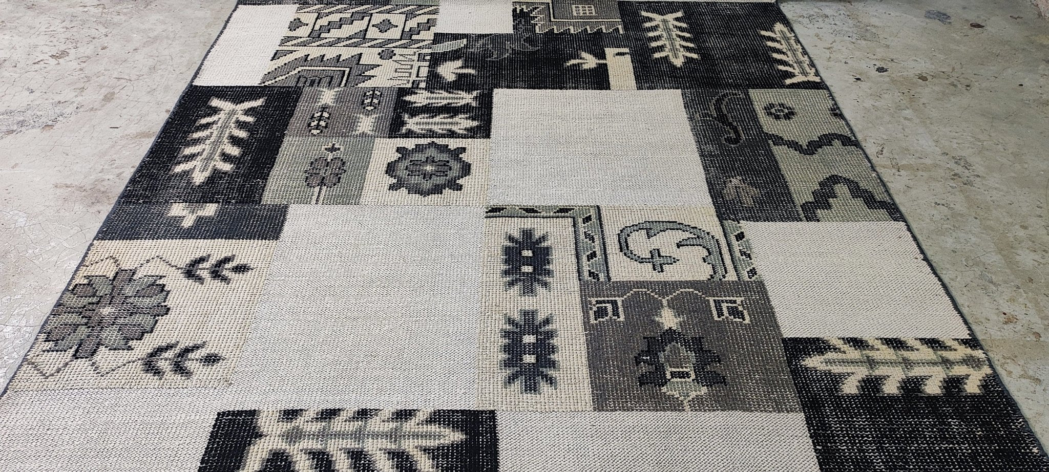 Alexis Cottrell Black and White Hand-Knotted Patch Weave Rug 6x9 | Banana Manor Rug Company