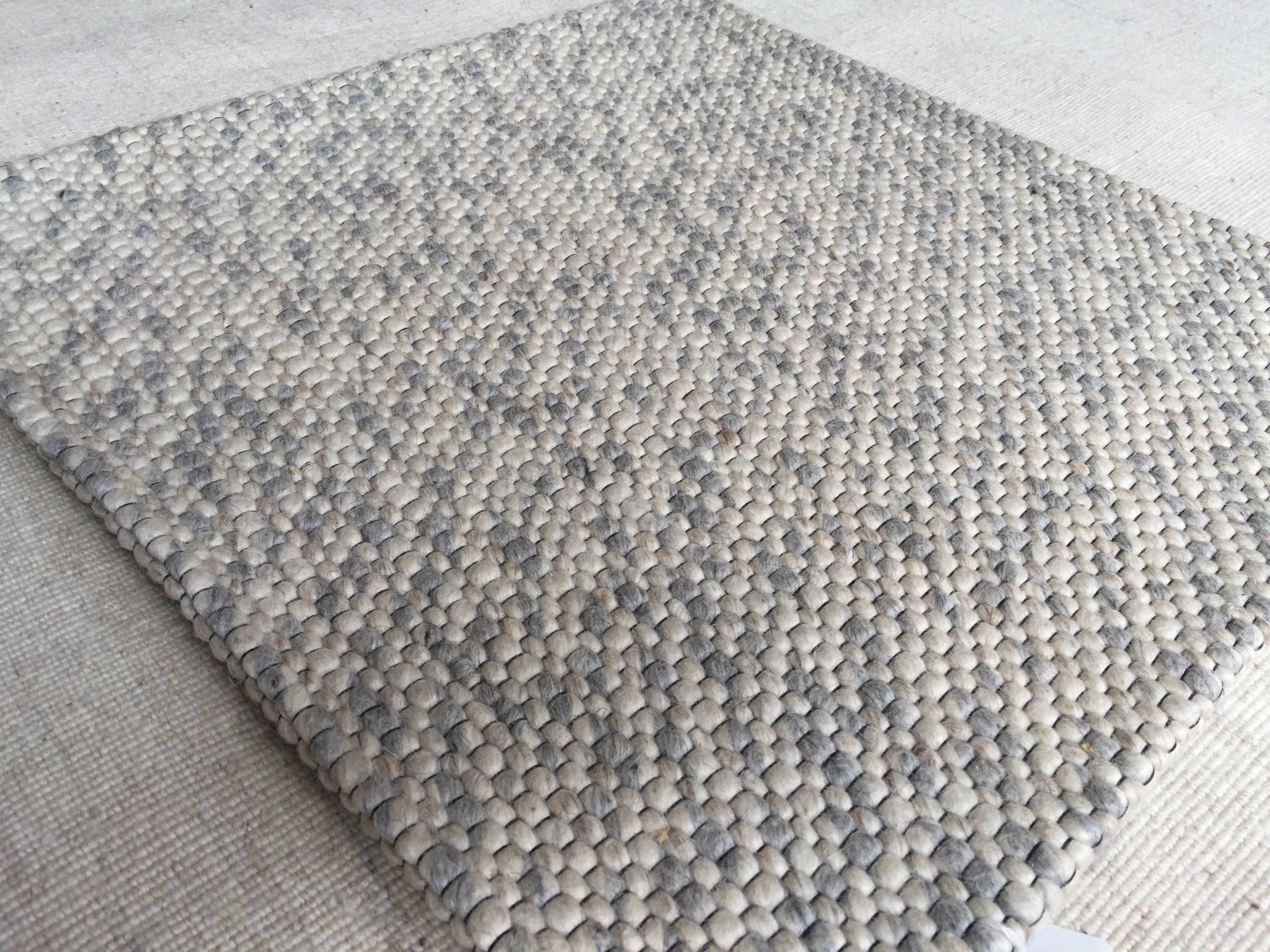 Cloudy With a Chance of Paradise Handwoven Jacquard Wool Rug | Banana Manor Rug Company