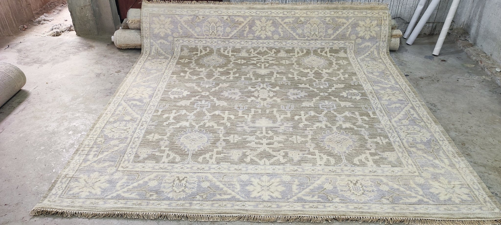 https://bananamanor.com/cdn/shop/products/helen-ohara-silver-and-grey-hand-knotted-oushak-rug-8x8-348581.jpg?v=1693171586