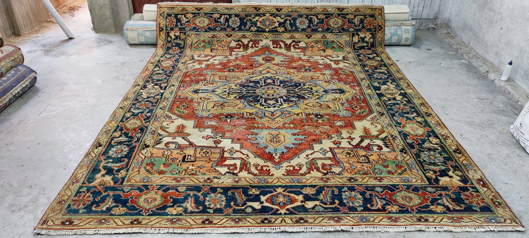 Jacqueline McKenzie Hand-Knotted Heriz Rug Rust and Blue 8X9.9 | Banana Manor Rug Company