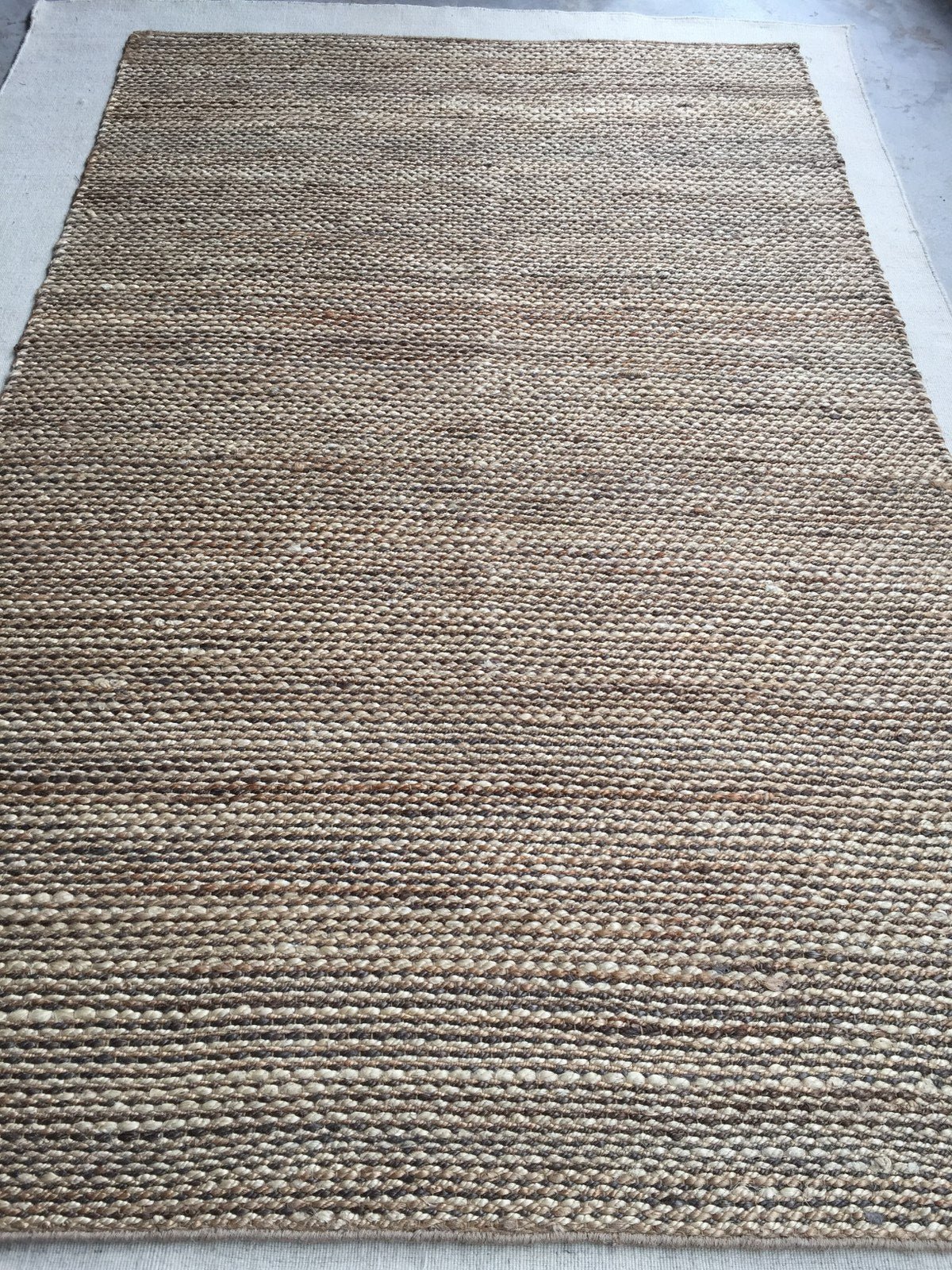 Kelly LeBrock Handwoven Jute Durrie/Natural | Banana Manor Rug Company