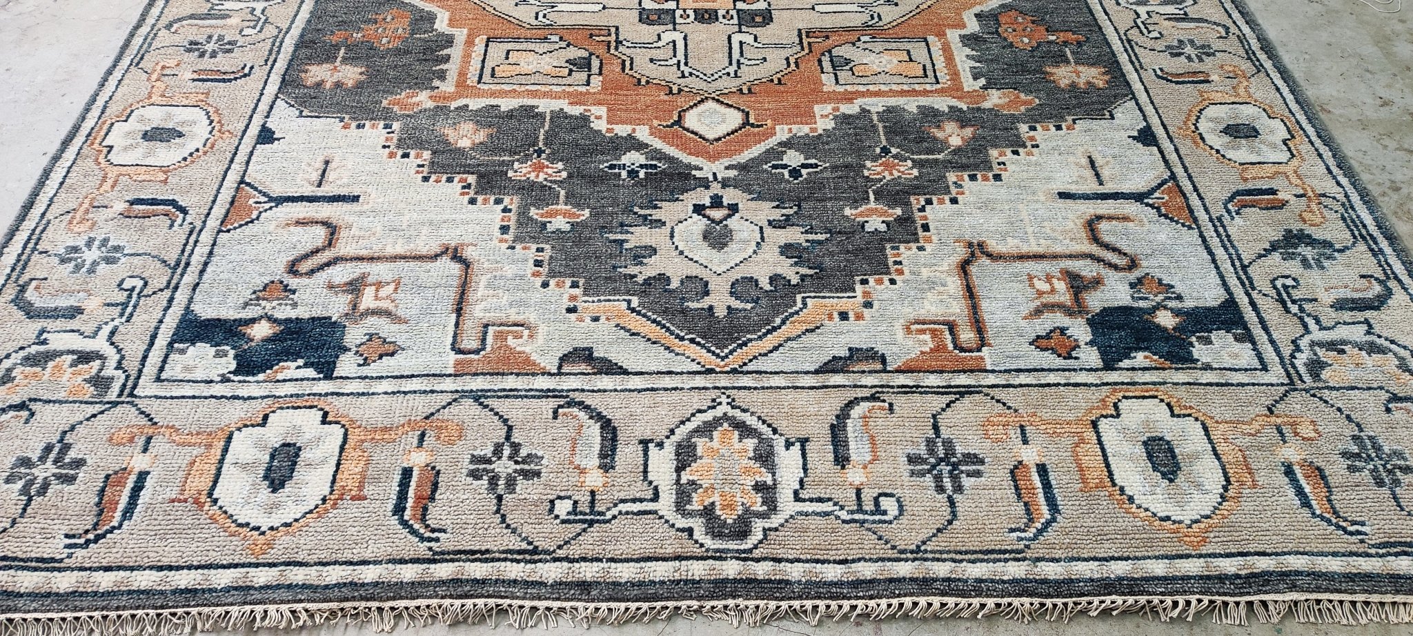 https://bananamanor.com/cdn/shop/products/kirsten-kelli-grey-and-beige-hand-knotted-oriental-rug-8x10-219968.jpg?v=1683159250