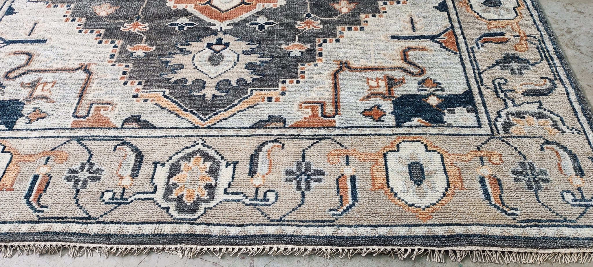 https://bananamanor.com/cdn/shop/products/kirsten-kelli-grey-and-beige-hand-knotted-oriental-rug-8x10-784476.jpg?v=1683159250