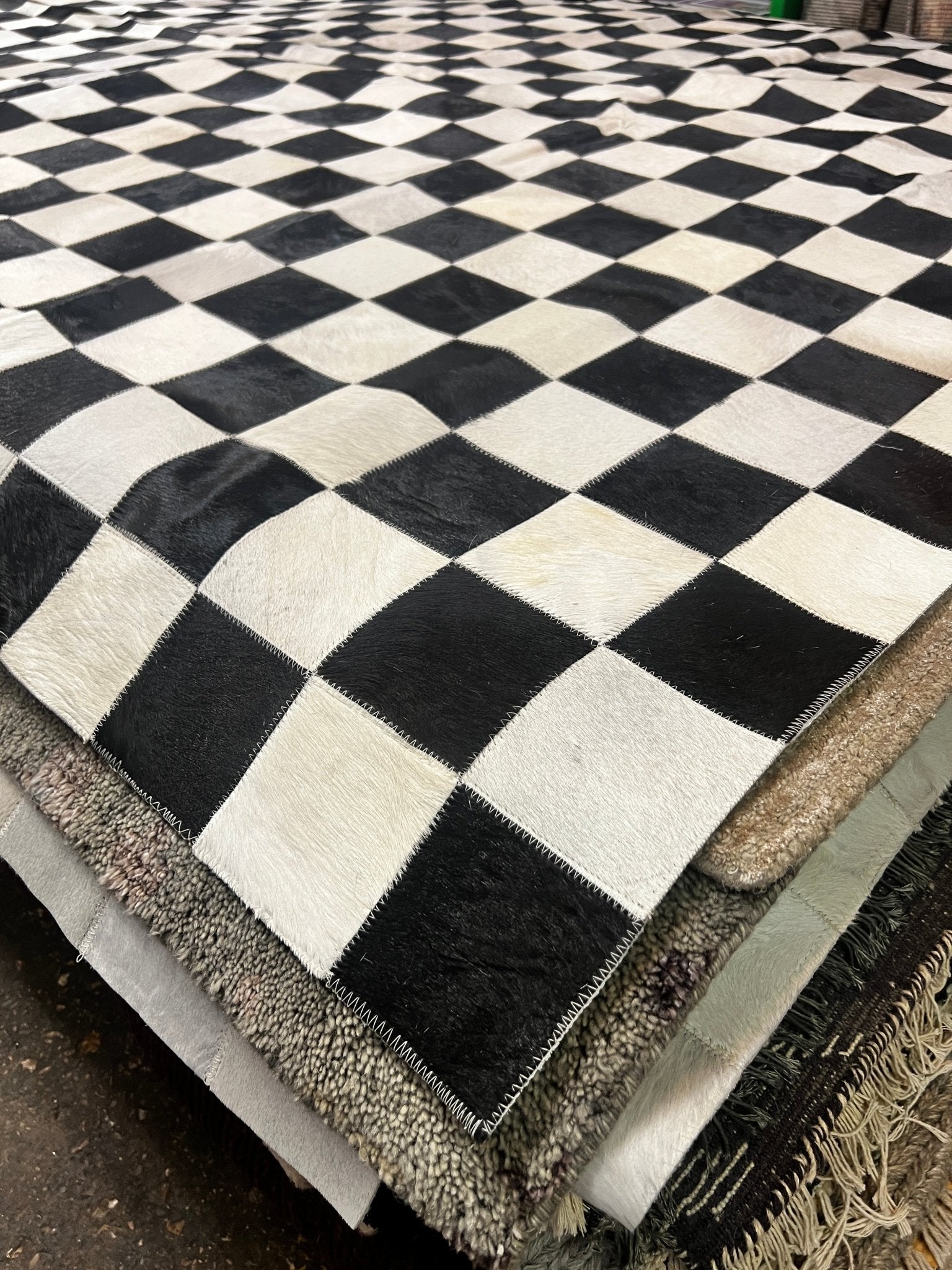 Pogged Rug Cowhide Rug Black