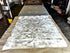 Off White and Tan Patched Cowhide 6.7x9.2 Rug With Border | Banana Manor Rug Company