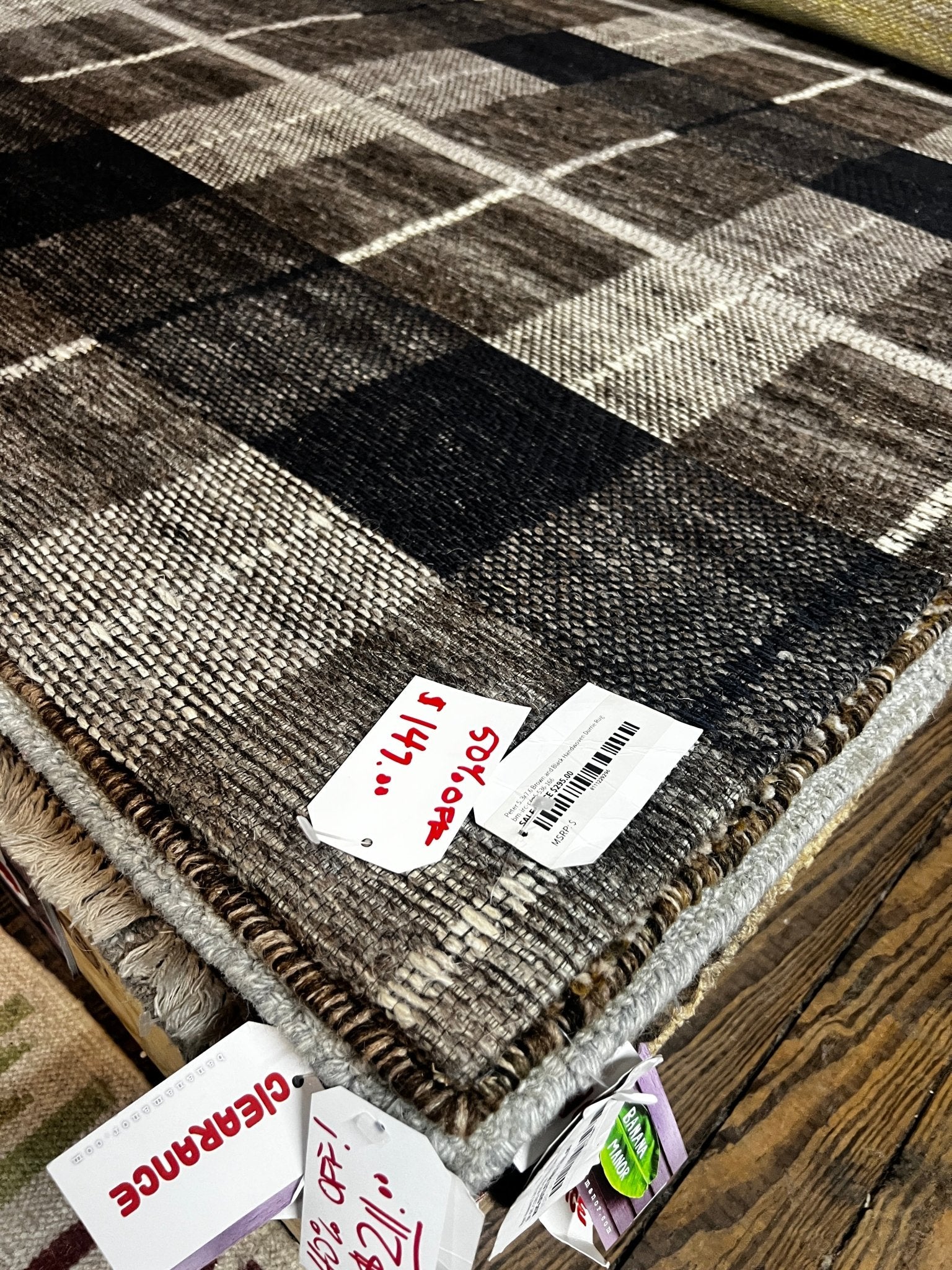 https://bananamanor.com/cdn/shop/products/peter-53x76-brown-and-black-handwoven-durrie-rug-390015.jpg?v=1686958994