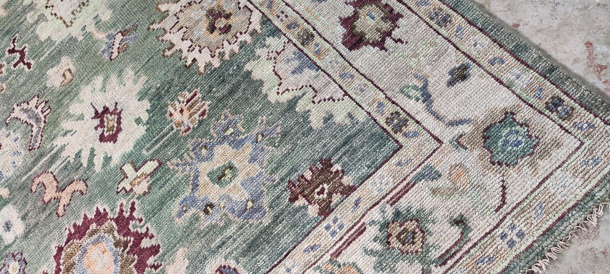 https://bananamanor.com/cdn/shop/products/sarah-brooks-green-and-tan-hand-knotted-oushak-rug-6x9-538343.jpg?v=1683162605