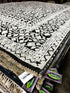 Zanobia 6.3x9 Black & Ivory High Low Hand Knotted | Banana Manor Rug Factory Outlet