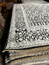 Zanobia 6.3x9 Black & Ivory High Low Hand Knotted | Banana Manor Rug Factory Outlet