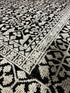 Zanobia 6.3x9 Black & Ivory High Low Hand Knotted | Banana Manor Rug Factory Outlet