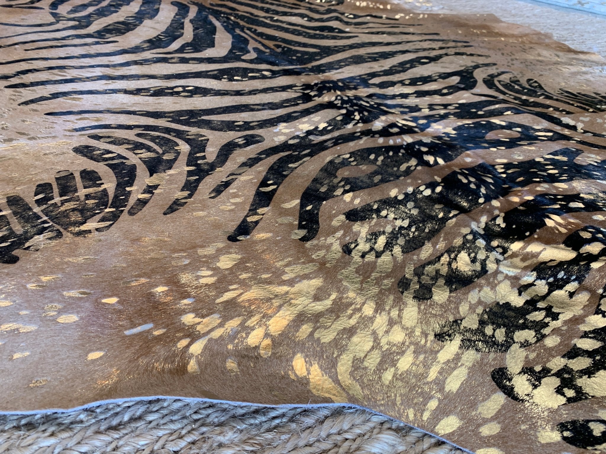 Zebra Print Cowhide With Gold Accents | Banana Manor Rug Company